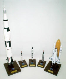 Grouping of 1/100 scale space models with Saturn V Rocket